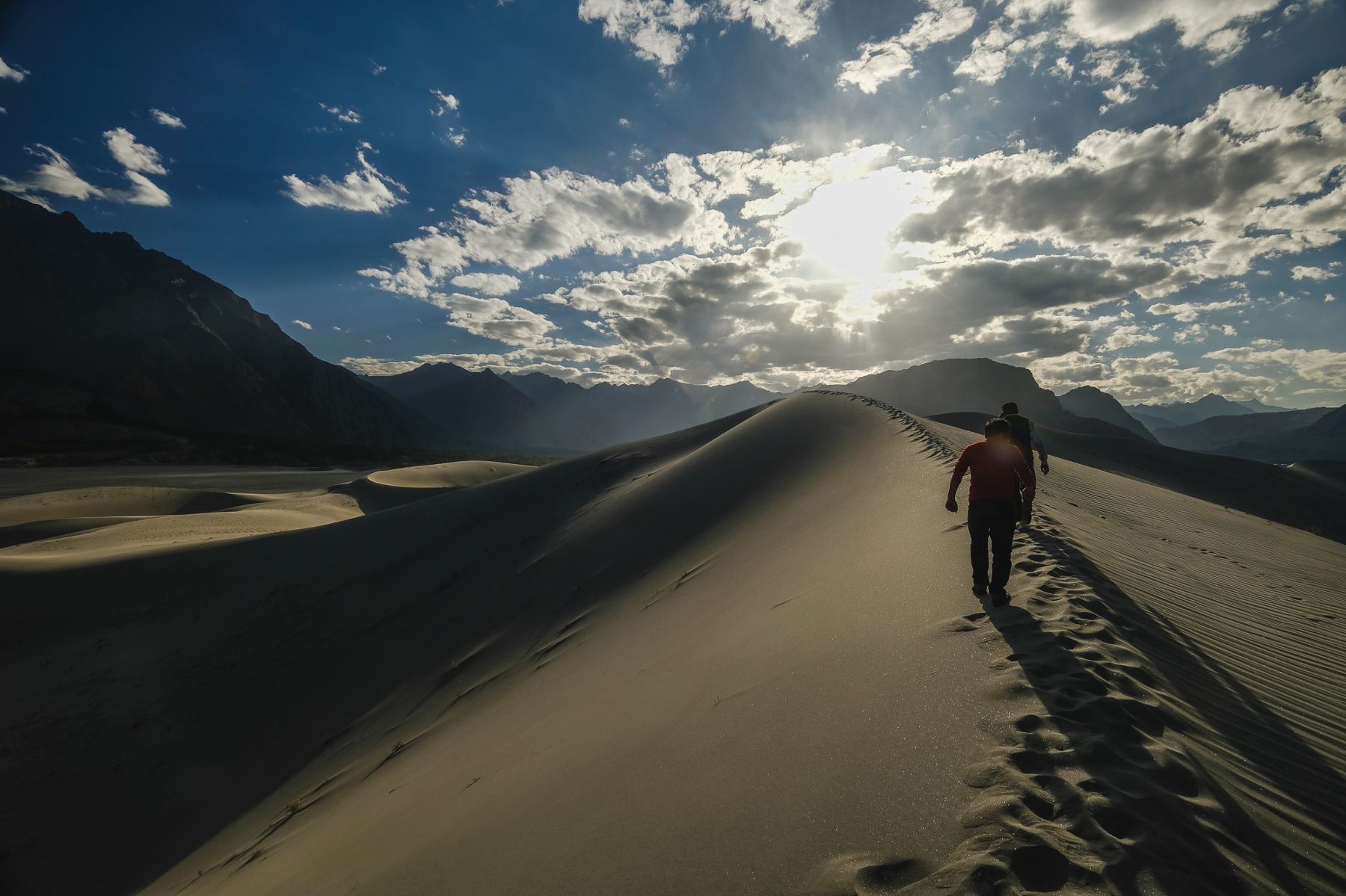 walking on the sand dunes of the safaranga desert skardu region