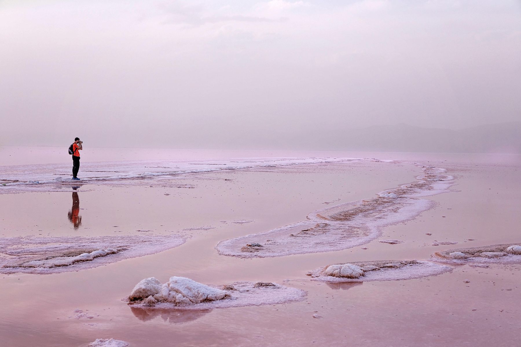 pink saline lake exploring iran on tour